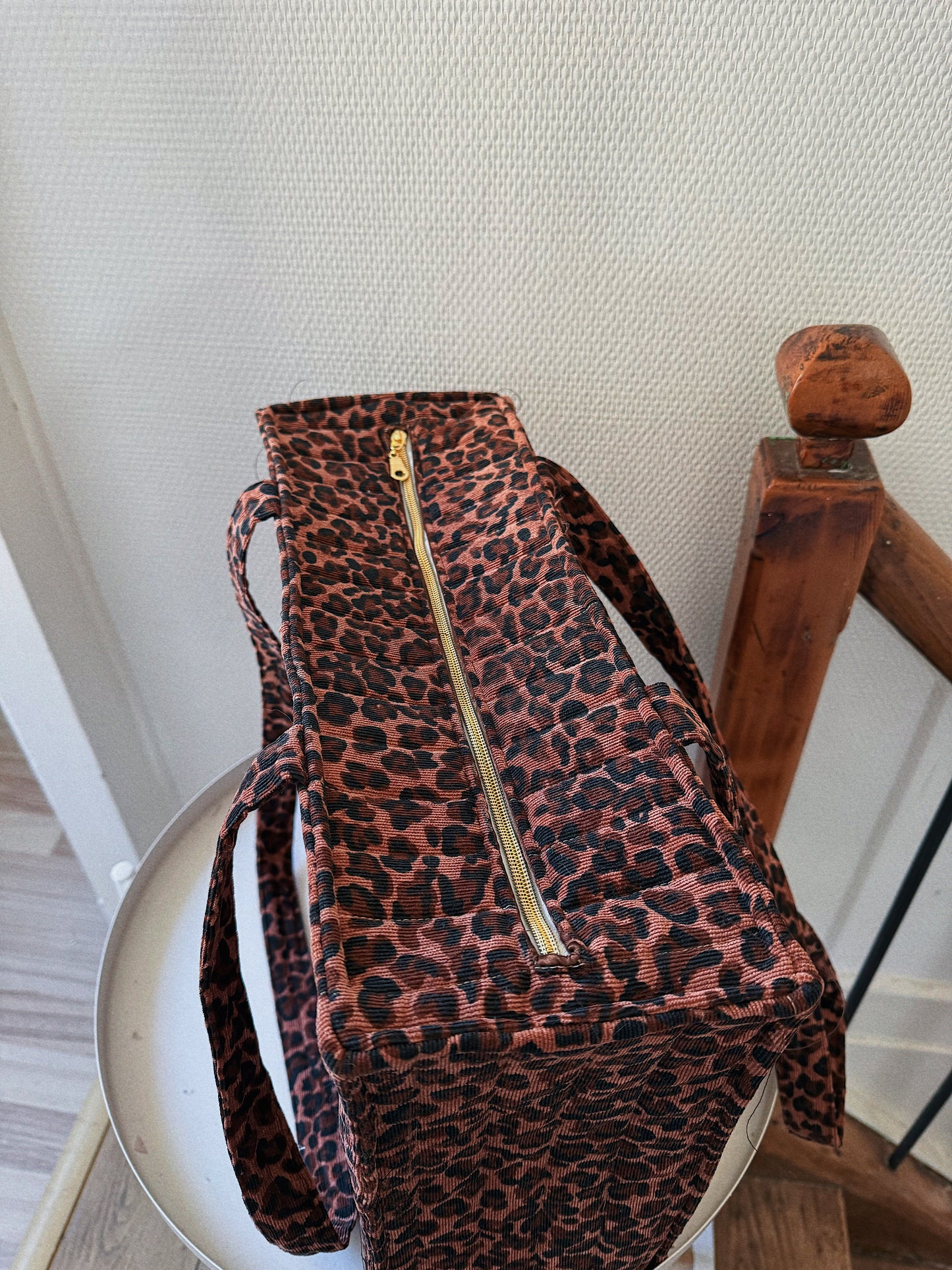 Fermeture zip sur le dessus